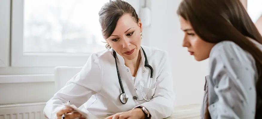 spotting before period symptoms and causes