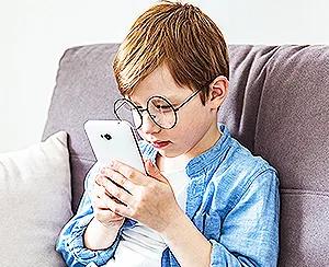 A kid struggling with nearsightedness