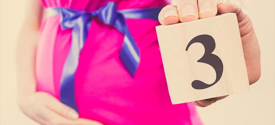 Pregnant woman practicing yoga - Staying Active in the Third Trimester