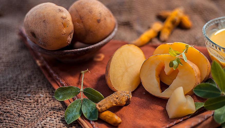 grated potato and turmeric ingredients for a potato face mask